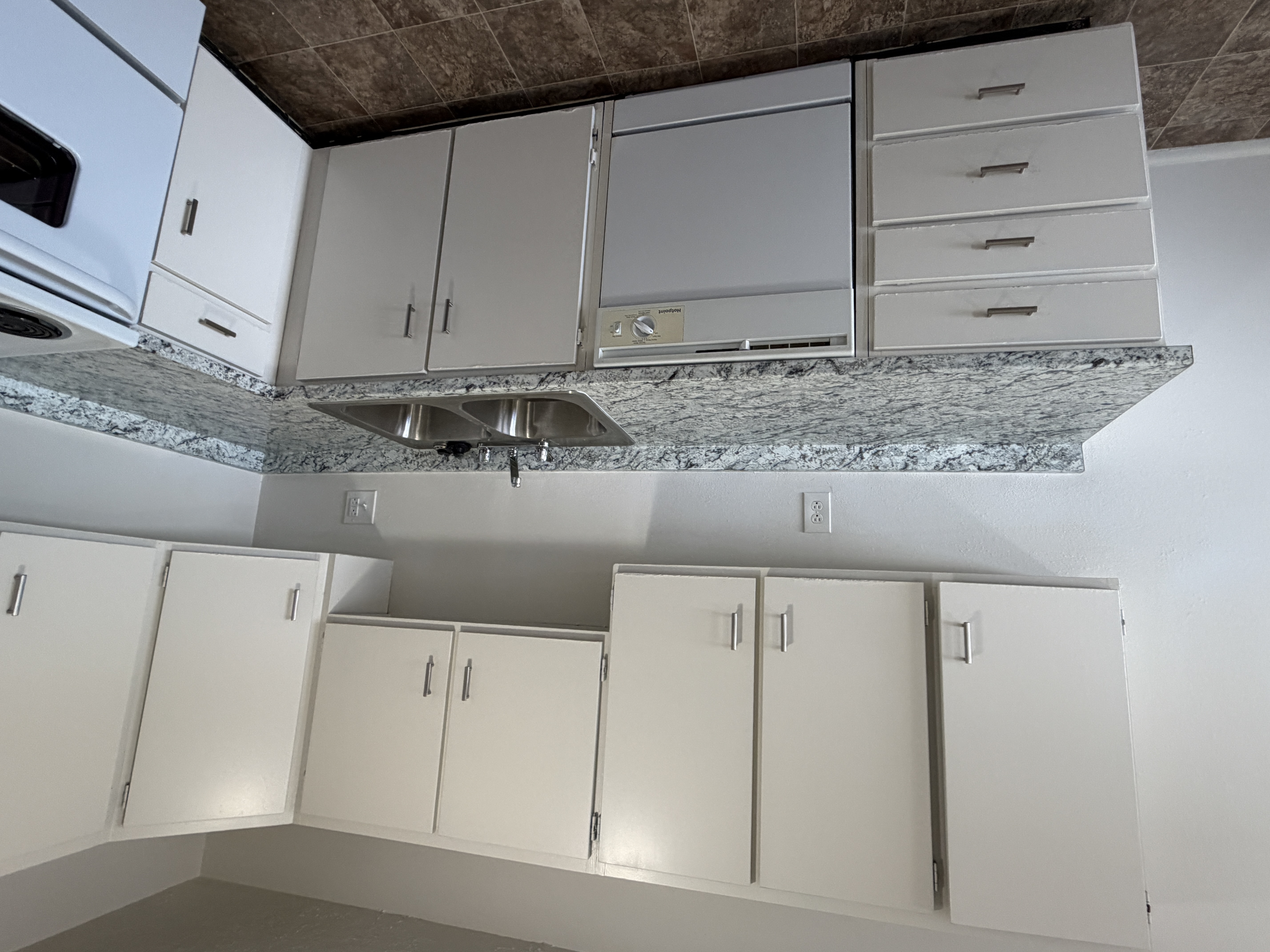 Updated kitchen with granite countertops and dishwasher