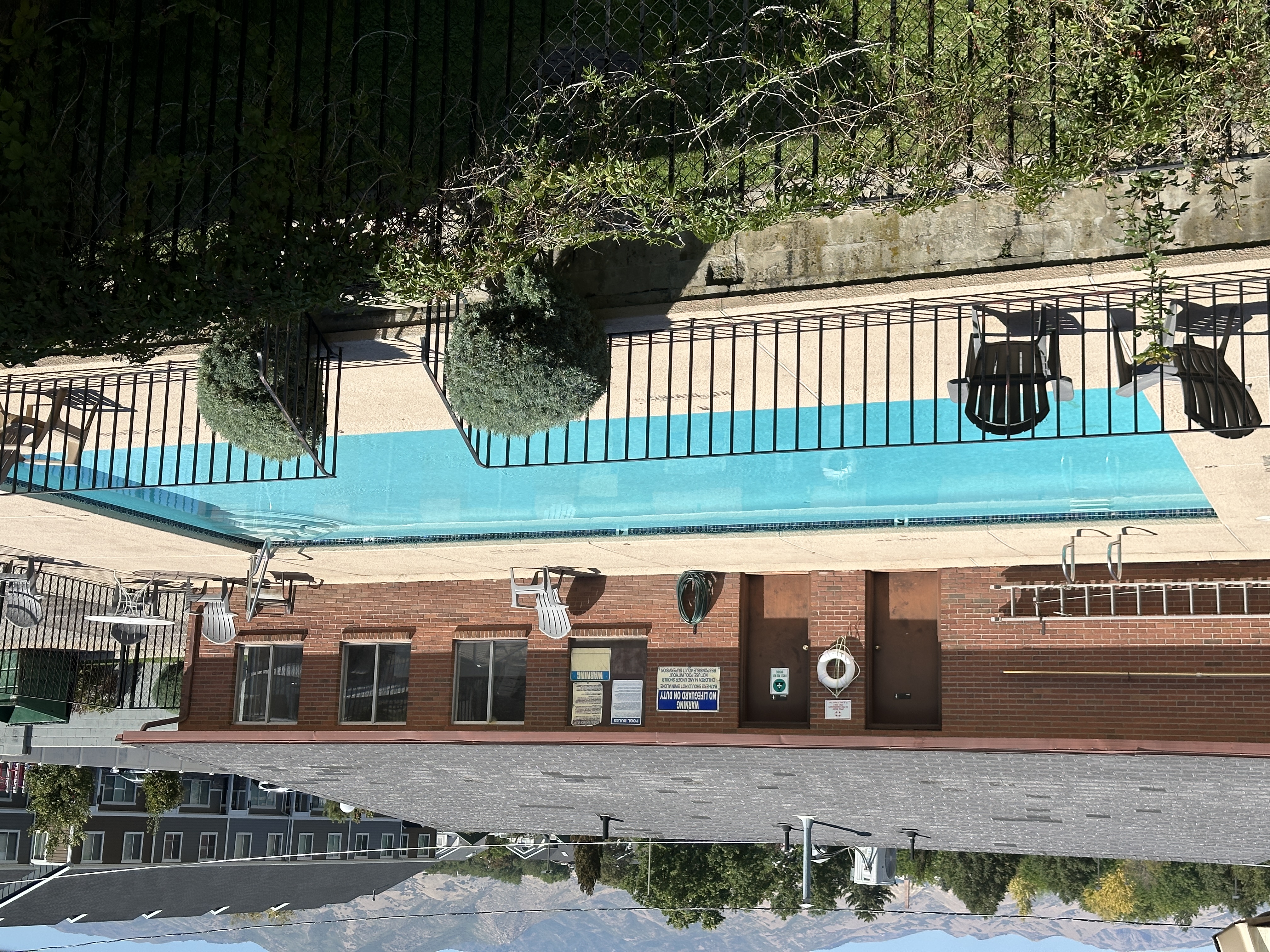 Community pool with mountain views